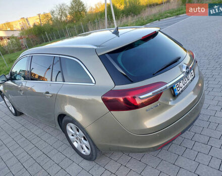 Зеленый Опель Инсигния, объемом двигателя 1.96 л и пробегом 240 тыс. км за 11800 $, фото 3 на Automoto.ua