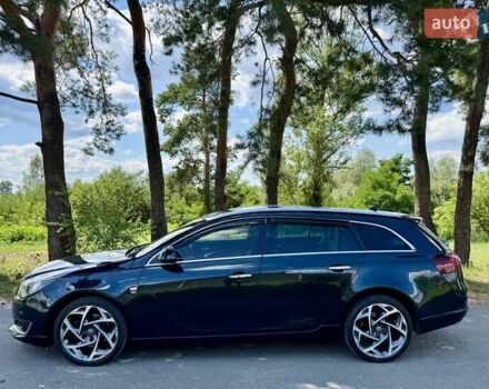 Зелений Опель Інсігнія, об'ємом двигуна 2 л та пробігом 257 тис. км за 9499 $, фото 6 на Automoto.ua