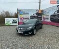 Зеленый Опель Инсигния, объемом двигателя 2 л и пробегом 255 тыс. км за 9199 $, фото 1 на Automoto.ua