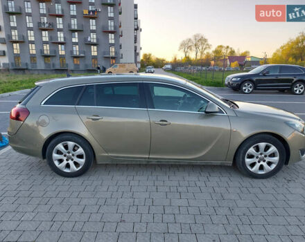 Зеленый Опель Инсигния, объемом двигателя 1.96 л и пробегом 240 тыс. км за 11800 $, фото 5 на Automoto.ua