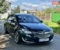 Зелений Опель Інсігнія, об'ємом двигуна 2 л та пробігом 257 тис. км за 9499 $, фото 2 на Automoto.ua