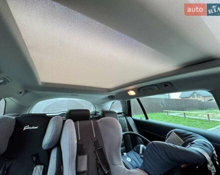 Зеленый Опель Инсигния, объемом двигателя 1.96 л и пробегом 225 тыс. км за 10600 $, фото 10 на Automoto.ua