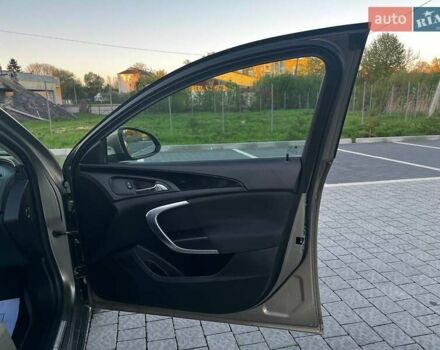 Зеленый Опель Инсигния, объемом двигателя 1.96 л и пробегом 240 тыс. км за 11800 $, фото 58 на Automoto.ua