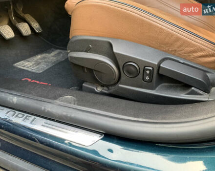 Зеленый Опель Инсигния, объемом двигателя 1.6 л и пробегом 140 тыс. км за 12350 $, фото 28 на Automoto.ua