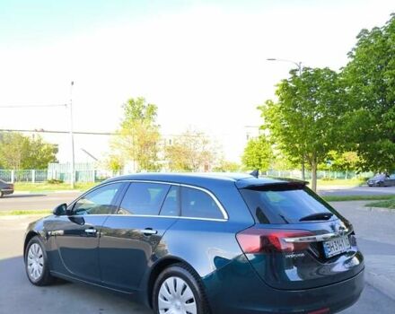 Зелений Опель Інсігнія, об'ємом двигуна 1.96 л та пробігом 273 тис. км за 11500 $, фото 4 на Automoto.ua