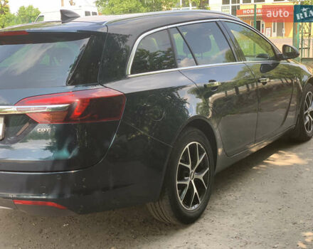 Зеленый Опель Инсигния, объемом двигателя 1.6 л и пробегом 140 тыс. км за 12350 $, фото 2 на Automoto.ua