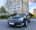 Зелений Опель Інсігнія, об'ємом двигуна 1.96 л та пробігом 273 тис. км за 11199 $, фото 1 на Automoto.ua