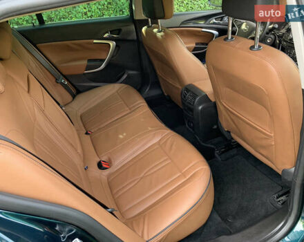 Зеленый Опель Инсигния, объемом двигателя 1.6 л и пробегом 140 тыс. км за 12350 $, фото 8 на Automoto.ua