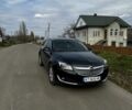 Зелений Опель Інсігнія, об'ємом двигуна 2 л та пробігом 252 тис. км за 9998 $, фото 1 на Automoto.ua