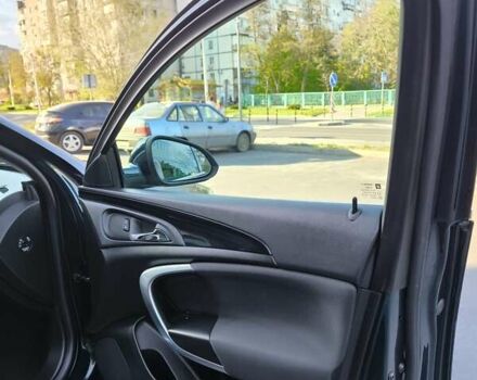 Зелений Опель Інсігнія, об'ємом двигуна 1.96 л та пробігом 273 тис. км за 11500 $, фото 26 на Automoto.ua