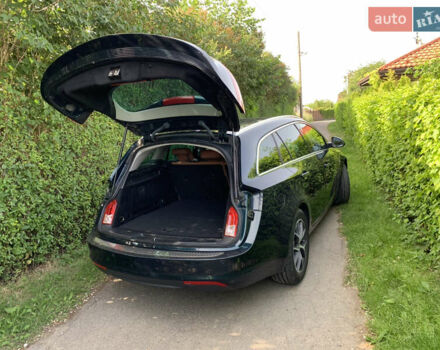 Зеленый Опель Инсигния, объемом двигателя 1.6 л и пробегом 140 тыс. км за 12350 $, фото 34 на Automoto.ua