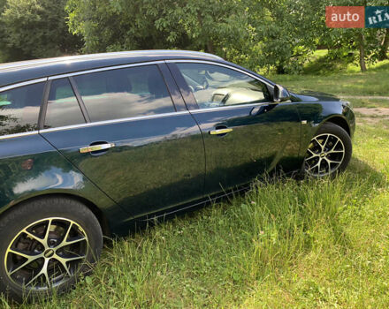 Зеленый Опель Инсигния, объемом двигателя 1.6 л и пробегом 140 тыс. км за 12350 $, фото 16 на Automoto.ua