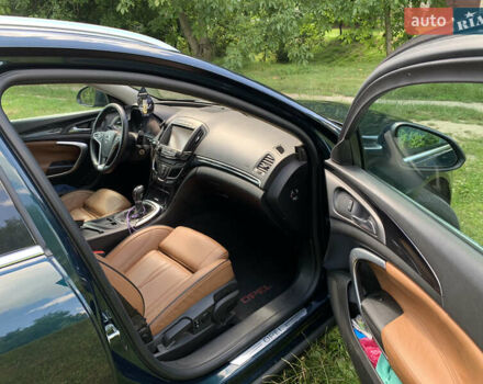 Зеленый Опель Инсигния, объемом двигателя 1.6 л и пробегом 140 тыс. км за 12350 $, фото 11 на Automoto.ua