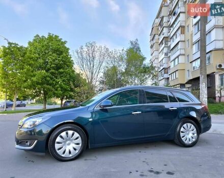 Зелений Опель Інсігнія, об'ємом двигуна 1.96 л та пробігом 273 тис. км за 11500 $, фото 3 на Automoto.ua