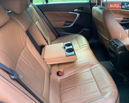 Зеленый Опель Инсигния, объемом двигателя 1.6 л и пробегом 140 тыс. км за 12350 $, фото 9 на Automoto.ua