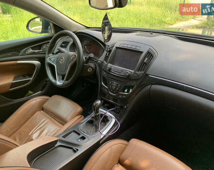 Зеленый Опель Инсигния, объемом двигателя 1.6 л и пробегом 140 тыс. км за 12350 $, фото 10 на Automoto.ua