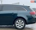 Зелений Опель Інсігнія, об'ємом двигуна 2 л та пробігом 243 тис. км за 10990 $, фото 5 на Automoto.ua