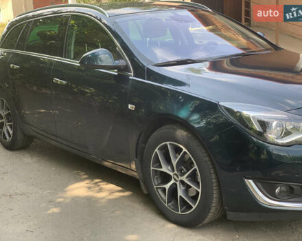 Зеленый Опель Инсигния, объемом двигателя 1.6 л и пробегом 140 тыс. км за 12350 $, фото 4 на Automoto.ua