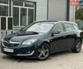 Зелений Опель Інсігнія, об'ємом двигуна 1.96 л та пробігом 257 тис. км за 10799 $, фото 9 на Automoto.ua