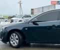 Зелений Опель Інсігнія, об'ємом двигуна 2 л та пробігом 243 тис. км за 10990 $, фото 3 на Automoto.ua