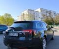 Зелений Опель Інсігнія, об'ємом двигуна 1.96 л та пробігом 273 тис. км за 11199 $, фото 6 на Automoto.ua