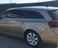 Зелений Опель Інсігнія, об'ємом двигуна 2 л та пробігом 263 тис. км за 9700 $, фото 2 на Automoto.ua