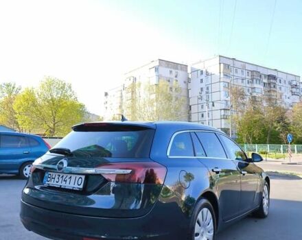 Зелений Опель Інсігнія, об'ємом двигуна 1.96 л та пробігом 273 тис. км за 11500 $, фото 5 на Automoto.ua
