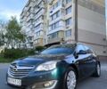 Зелений Опель Інсігнія, об'ємом двигуна 1.96 л та пробігом 273 тис. км за 11500 $, фото 11 на Automoto.ua