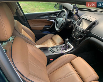 Зеленый Опель Инсигния, объемом двигателя 1.6 л и пробегом 140 тыс. км за 12350 $, фото 13 на Automoto.ua