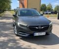 Зелений Опель Інсігнія, об'ємом двигуна 1.96 л та пробігом 188 тис. км за 12450 $, фото 1 на Automoto.ua
