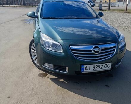 Зеленый Опель Инсигния, объемом двигателя 2 л и пробегом 235 тыс. км за 8000 $, фото 1 на Automoto.ua