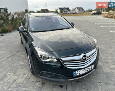 Зелений Опель Інсігнія, об'ємом двигуна 2 л та пробігом 215 тис. км за 10300 $, фото 1 на Automoto.ua