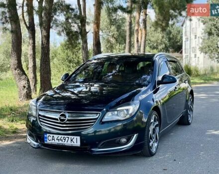 Зелений Опель Інсігнія, об'ємом двигуна 2 л та пробігом 257 тис. км за 8999 $, фото 1 на Automoto.ua