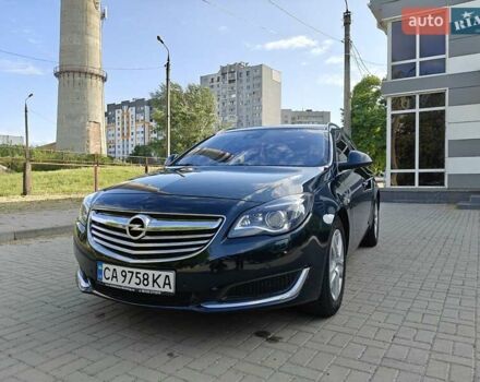 Зелений Опель Інсігнія, об'ємом двигуна 2 л та пробігом 206 тис. км за 9700 $, фото 1 на Automoto.ua