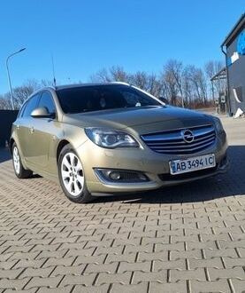 Зелений Опель Інсігнія, об'ємом двигуна 2 л та пробігом 263 тис. км за 9700 $, фото 1 на Automoto.ua