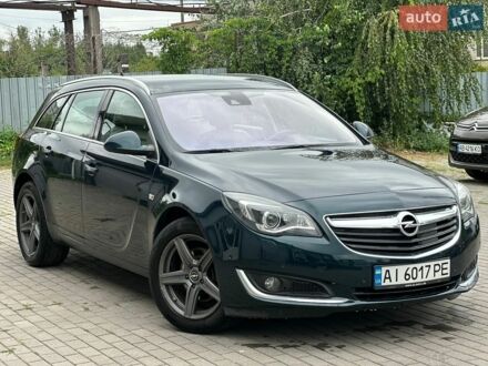 Зелений Опель Інсігнія, об'ємом двигуна 1.96 л та пробігом 257 тис. км за 10799 $, фото 1 на Automoto.ua