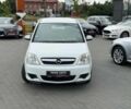 Белый Опель Мерива, объемом двигателя 1.7 л и пробегом 182 тыс. км за 5000 $, фото 1 на Automoto.ua