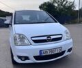 Белый Опель Мерива, объемом двигателя 1.7 л и пробегом 243 тыс. км за 3300 $, фото 4 на Automoto.ua