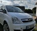 Белый Опель Мерива, объемом двигателя 1.6 л и пробегом 268 тыс. км за 3800 $, фото 2 на Automoto.ua
