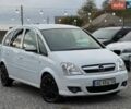 Белый Опель Мерива, объемом двигателя 1.4 л и пробегом 270 тыс. км за 3800 $, фото 1 на Automoto.ua
