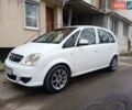 Белый Опель Мерива, объемом двигателя 1.3 л и пробегом 280 тыс. км за 3800 $, фото 1 на Automoto.ua