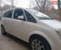 Белый Опель Мерива, объемом двигателя 1.3 л и пробегом 280 тыс. км за 4100 $, фото 1 на Automoto.ua
