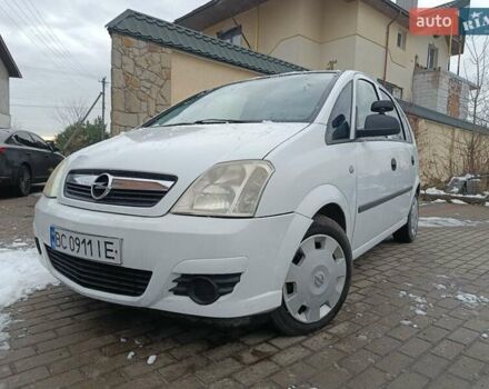 Белый Опель Мерива, объемом двигателя 1.4 л и пробегом 250 тыс. км за 3900 $, фото 1 на Automoto.ua