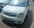 Белый Опель Мерива, объемом двигателя 1.3 л и пробегом 200 тыс. км за 3800 $, фото 1 на Automoto.ua