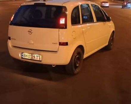 Белый Опель Мерива, объемом двигателя 1.3 л и пробегом 200 тыс. км за 3800 $, фото 2 на Automoto.ua