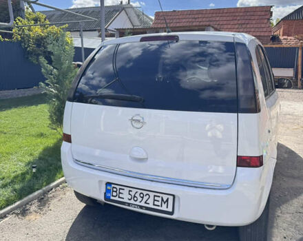 Белый Опель Мерива, объемом двигателя 1.69 л и пробегом 284 тыс. км за 4500 $, фото 1 на Automoto.ua
