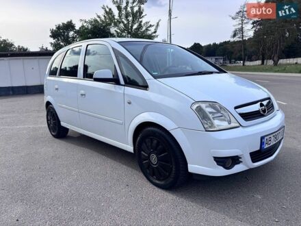 Белый Опель Мерива, объемом двигателя 1.7 л и пробегом 243 тыс. км за 3300 $, фото 1 на Automoto.ua