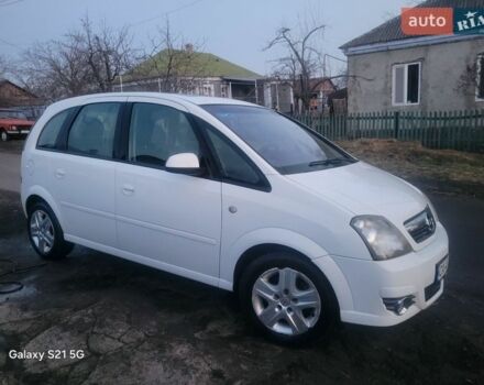 Белый Опель Мерива, объемом двигателя 1.36 л и пробегом 176 тыс. км за 5350 $, фото 1 на Automoto.ua