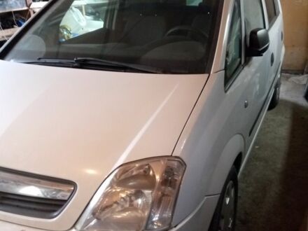 Белый Опель Мерива, объемом двигателя 1.4 л и пробегом 236 тыс. км за 5300 $, фото 1 на Automoto.ua