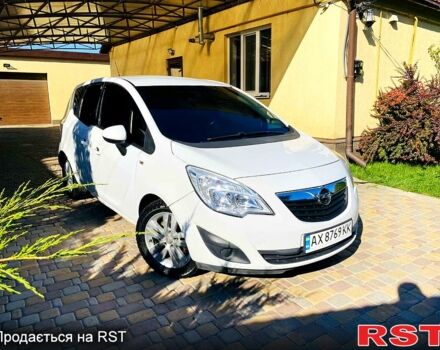Белый Опель Мерива, объемом двигателя 1.7 л и пробегом 225 тыс. км за 6950 $, фото 1 на Automoto.ua